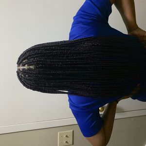 Xquisite Hair & Beauty's logo